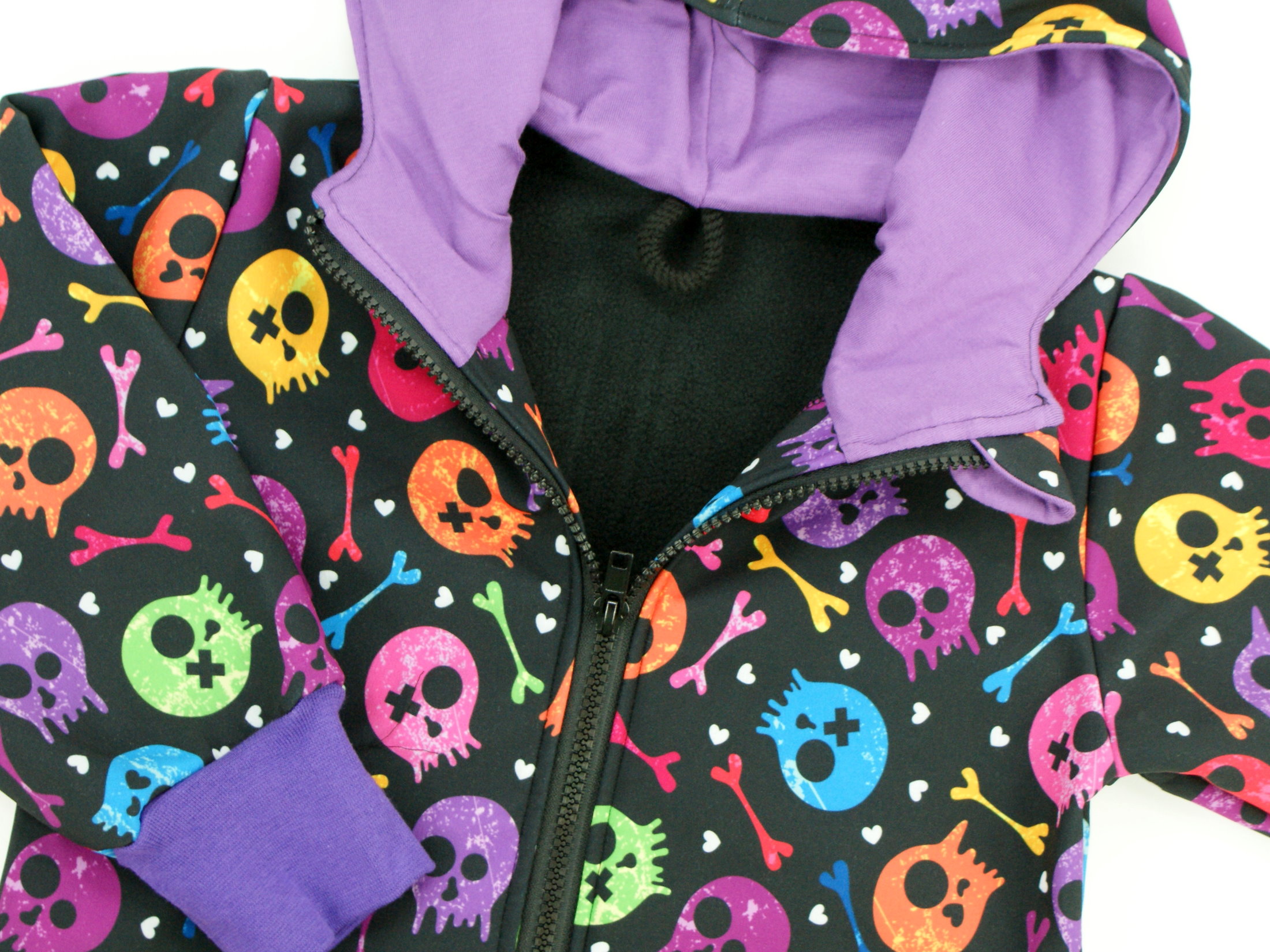 Kinder Softshell-Jacke "Colourful Skulls" lila schwarz